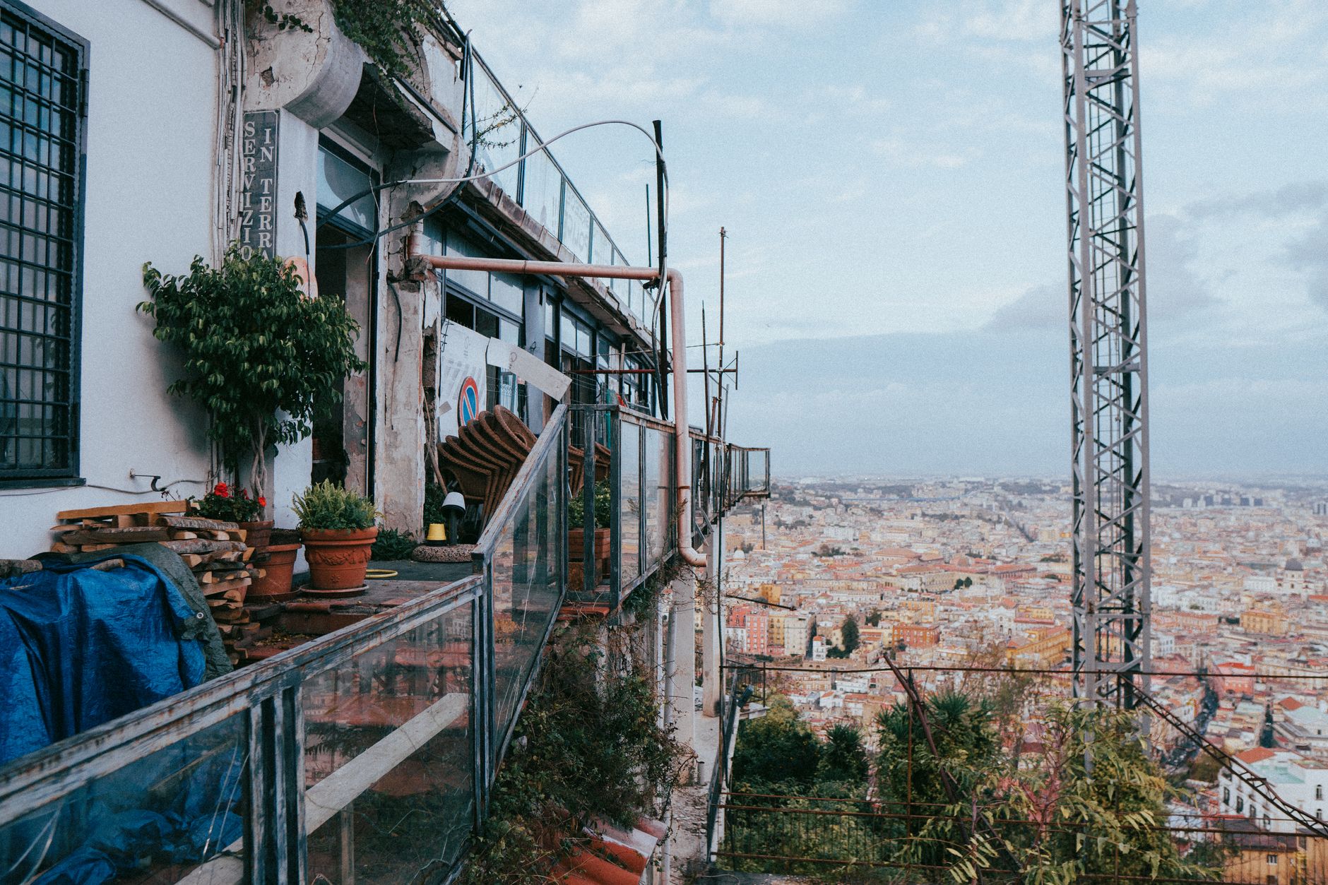 Beautiful urban view from a balcony in Neapolis, Italy showcasing cityscape and architecture.
